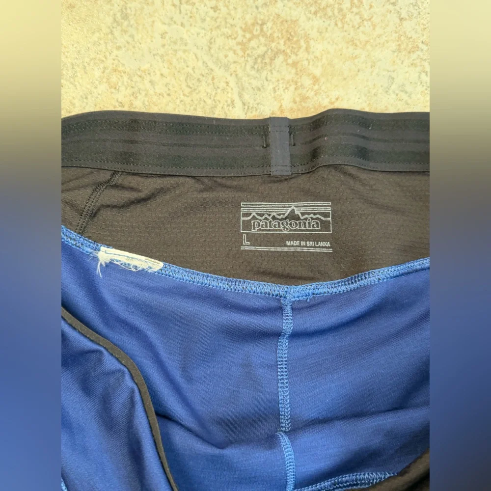 Patagonia women’s Royal Blue Leggings with Black Panels size large